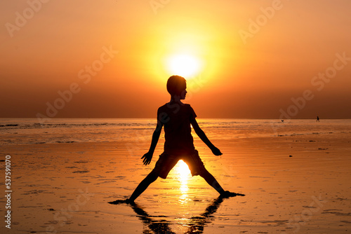 silhouette of a person on the beach