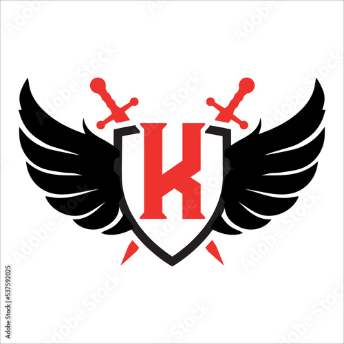 wing Letter k with sheild swords concept