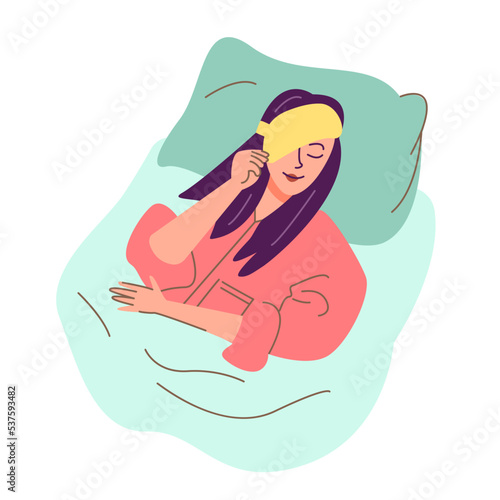 Woman yawning in the morning with the sleeping mask on