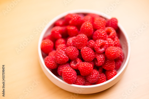 Raspberry fruit on the bowl
