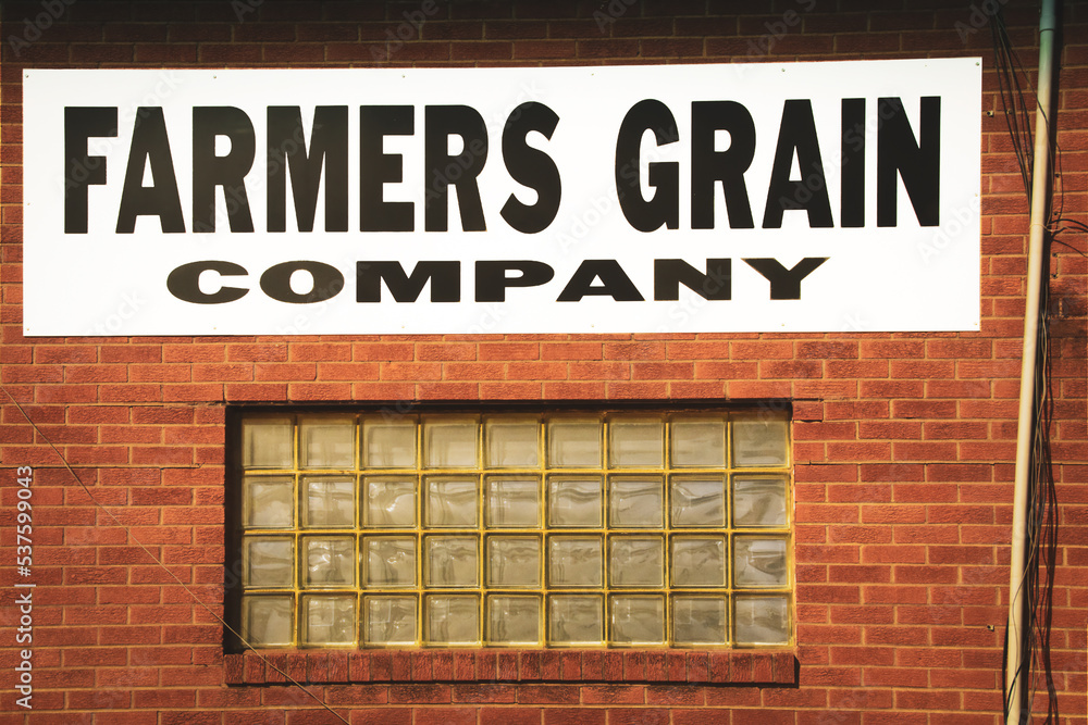 2019_02_08_Wakita Oklahoma USA Farmers Grain Company sign above glass