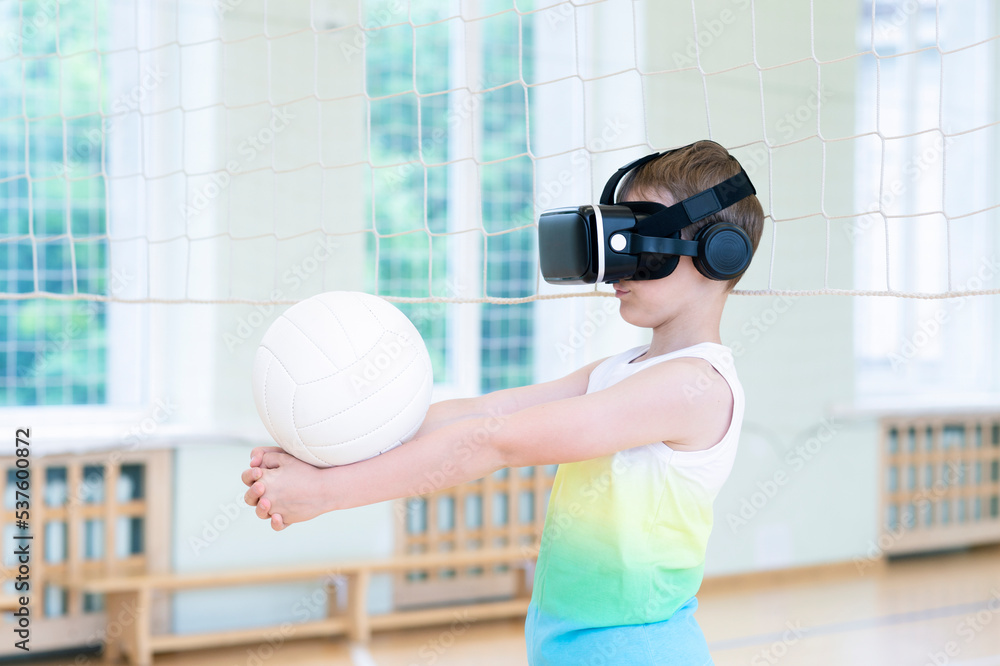 School kid with interactive glasses playing volleyball in a physical