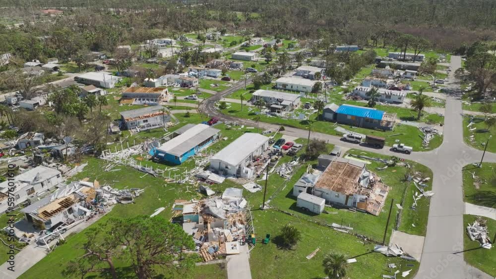 Badly damaged mobile homes after hurricane Ian in Florida residential area. Consequences of natural disaster Badly damaged mobile homes after hurricane Ian in Florida residential area. Consequences of natural disaster