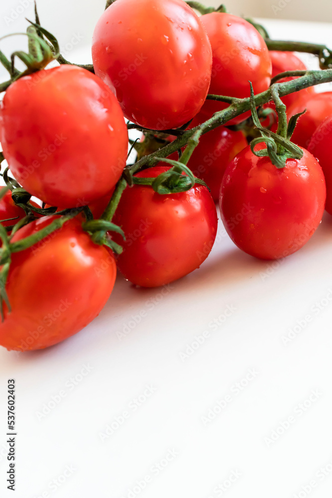 Cherry tomatoes. ripe red cherry tomatoes. lie on a white background