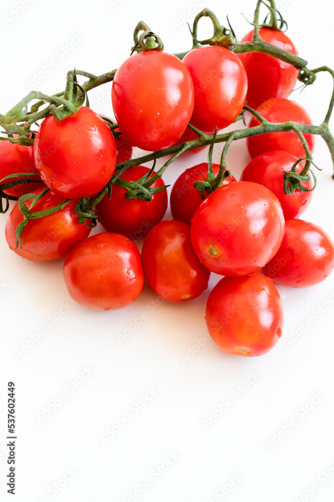 Cherry tomatoes. ripe red cherry tomatoes. lie on a white background