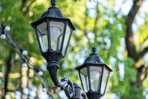 City metal lantern with antique light bulbs