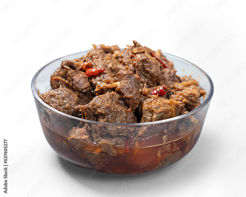 Traditional Beef Curry Served in transparent bowl front view on white Background Traditional Beef Curry Served in transparent bowl front view on white Background