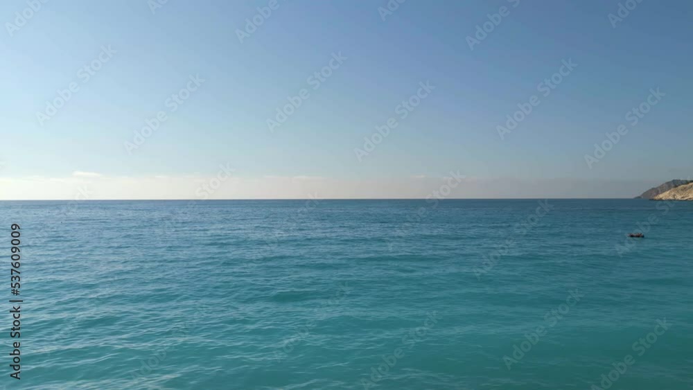 Aerial drone view of beautiful Ionian Sea with clear water in northern Kefalonia, Greece (4k, UHD) Aerial drone view of beautiful Ionian Sea with clear water in northern Kefalonia, Greece (4k, UHD)