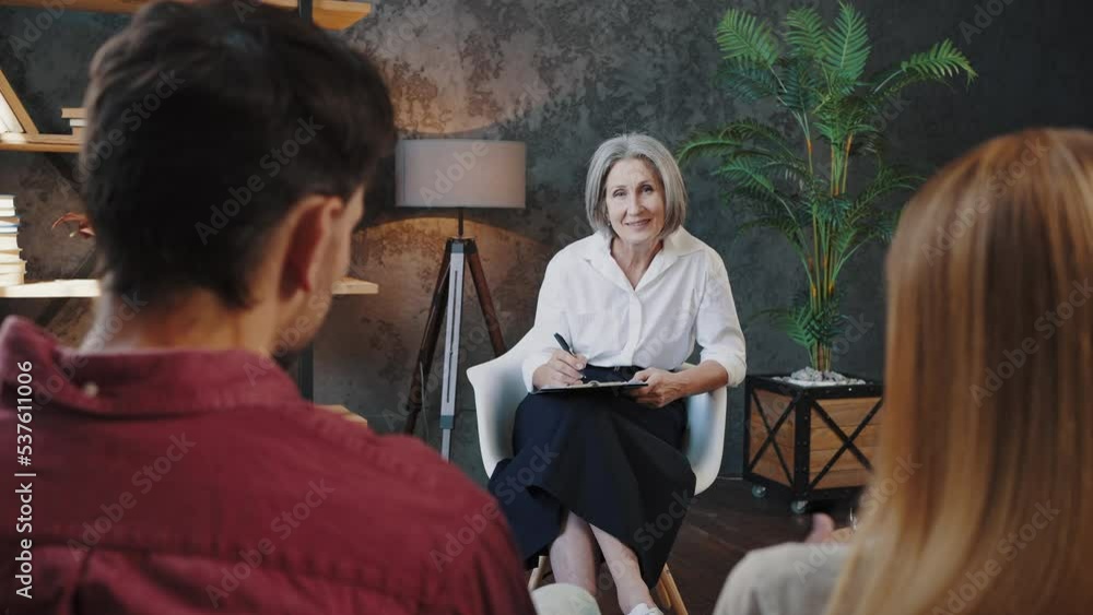 Young couple shares personal problems with psychologist Young couple shares personal problems with psychologist