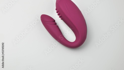 purple vibrator on a white background. Female muscle trainer. Vaginal egg for vaginal training. Women's health devices. Intimate things for sexuality for women photo