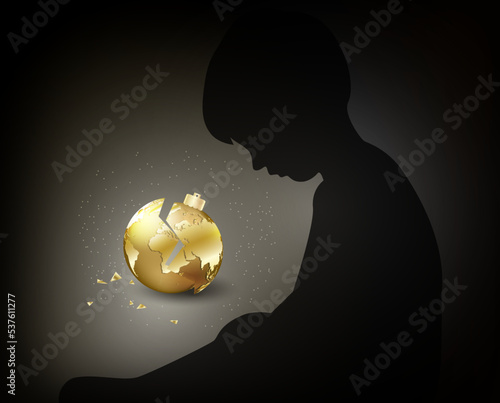 Broken Christmas golden ball with world map on it and silhouette of sad or crying baby boy on dark background. Conceptual vector illustration of fragility of planet Earth.