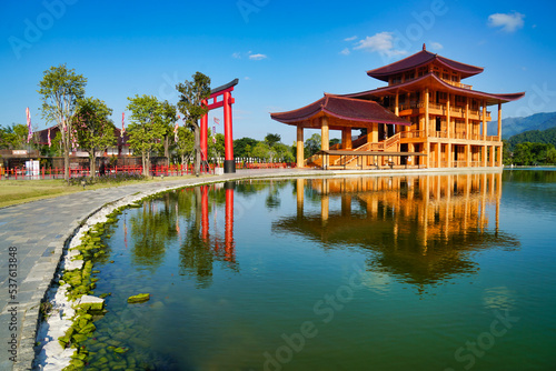 An ancient Japanese-style building near the lake on a blue sky day, located in Hinoki Land Thailand, is a tourist attraction in Chiang Mai, Thailand.