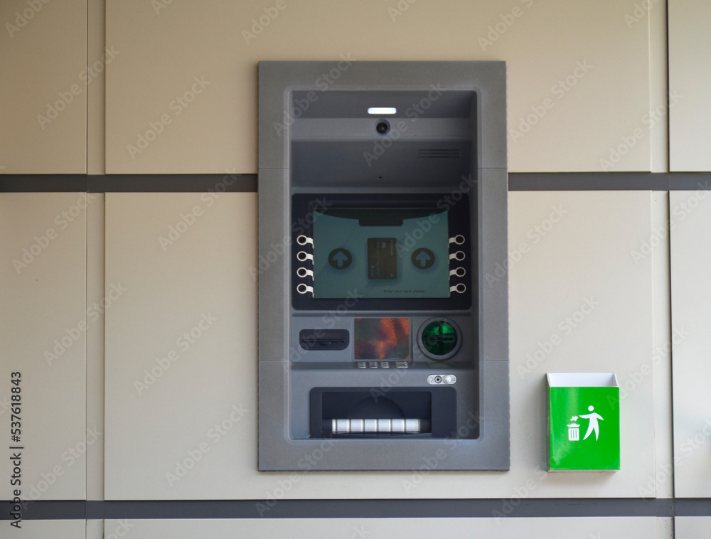 ATM in the wall of the building with the approach from the street. cash withdrawals, payments and transfers without coming to the bank ATM in the wall of the building with the approach from the street. cash withdrawals, payments and transfers without coming to the bank