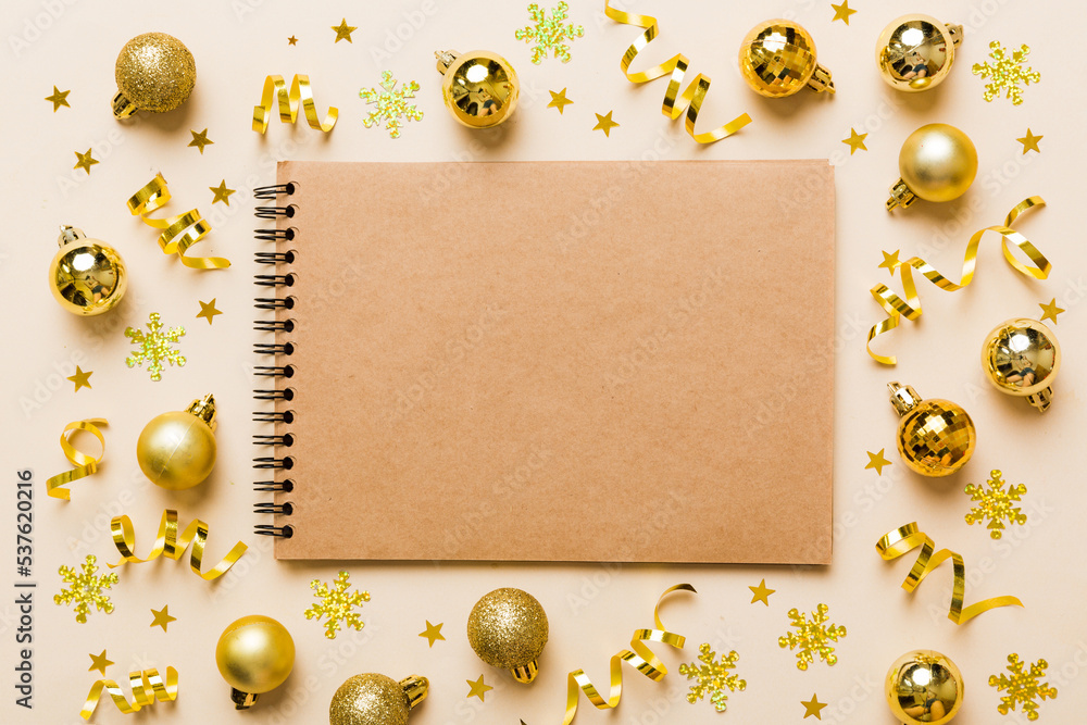 Fototapeta premium Christmas blank greeting card mock-up scene. Creative layout made of Christmas toy and paper card note. Flat lay. Nature New Year concept