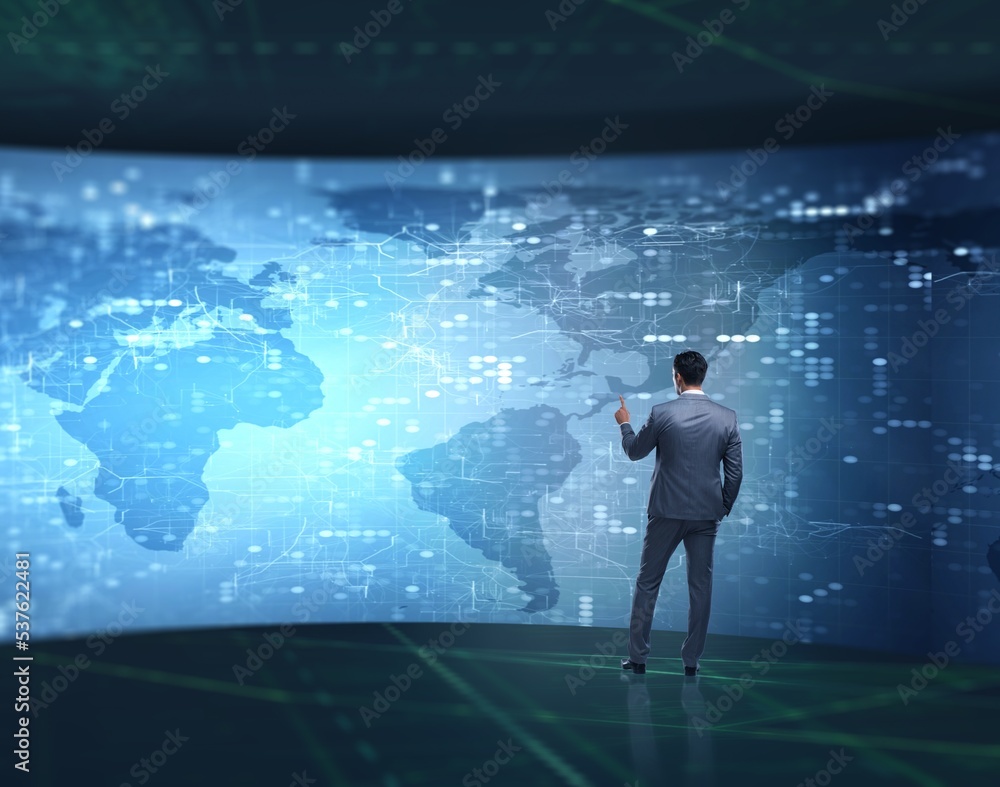 BUsinessman in futuristic computing concept BUsinessman in futuristic computing concept