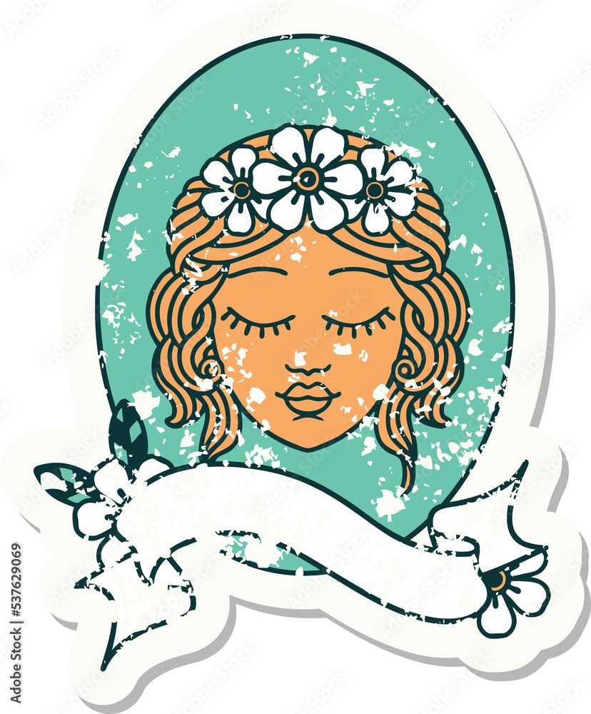 worn old sticker with banner of a maiden with eyes closed worn old sticker with banner of a maiden with eyes closed