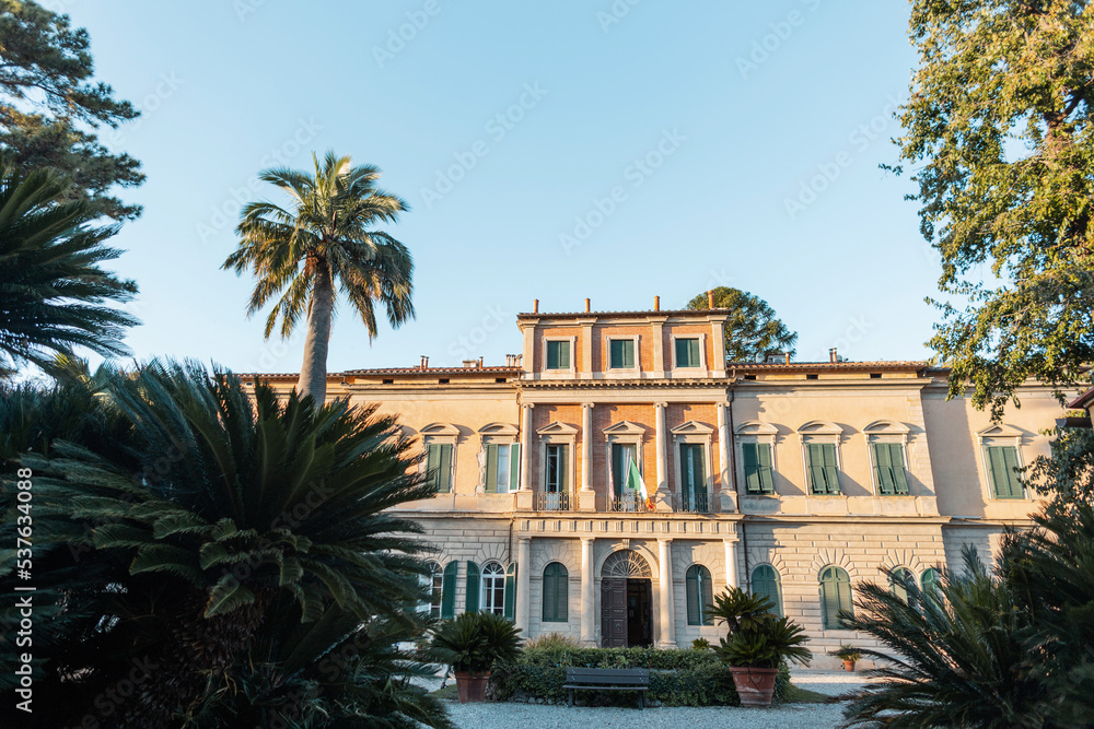 Beautiful vintage house with Palm trees in Italy. Travel and vacations in Italy