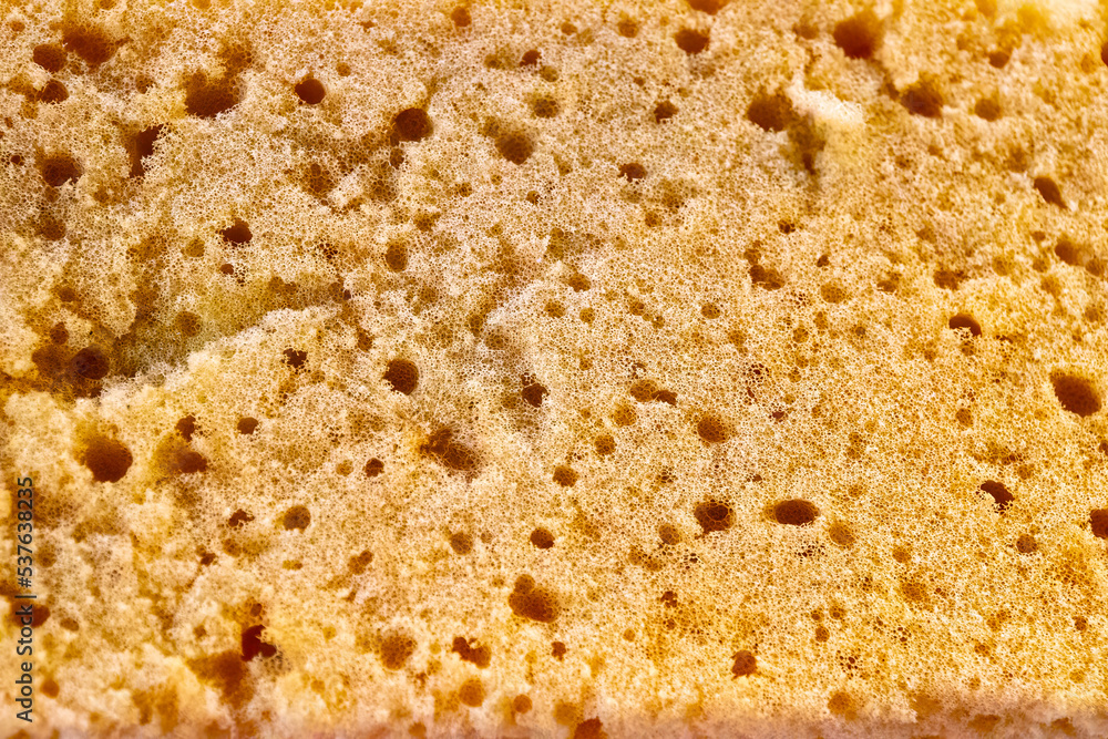 closeup yellow sponge background texture closeup yellow sponge background texture