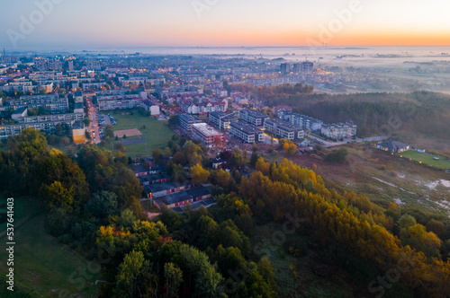 Fototapeta Naklejka Na Ścianę i Meble -  View at Pabianice city from a drone at sunset	
