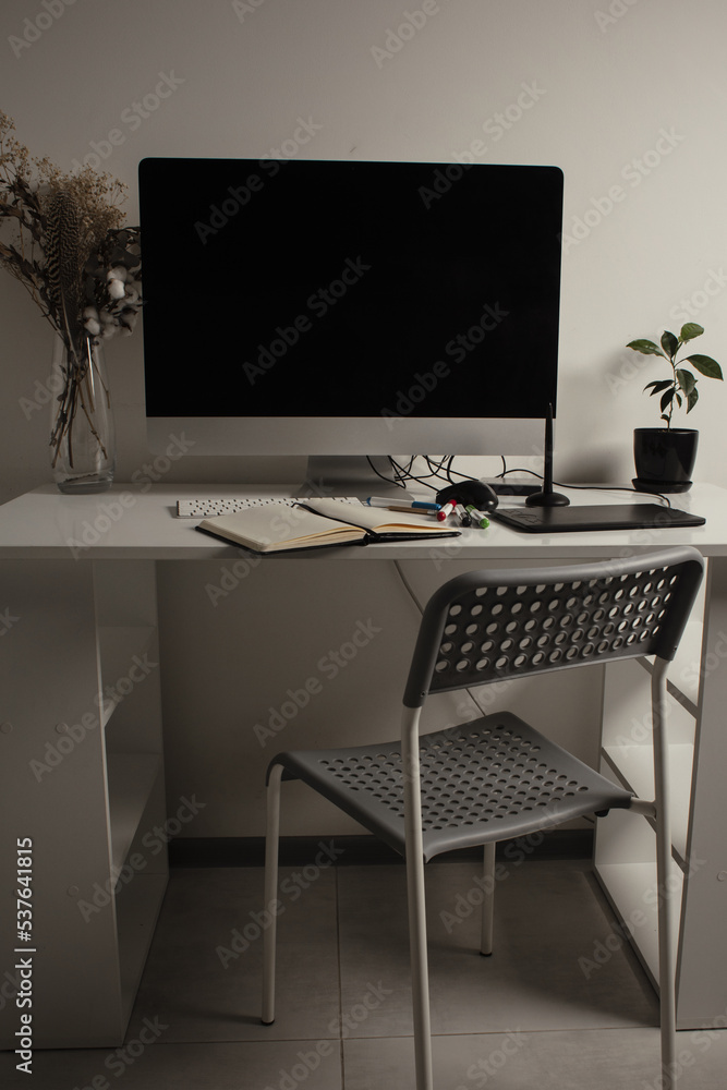 Comfortable place of work. Close-up top view of comfortable working place in office with and laptop. Workplace of designer. Notebook on the table. Business diary. Work at home. Place for making art. Comfortable place of work. Close-up top view of comfortable working place in office with and laptop. Workplace of designer. Notebook on the table. Business diary. Work at home. Place for making art.