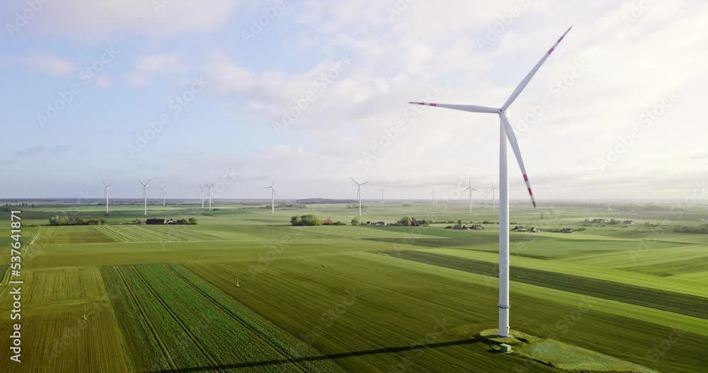 Aerial View of a Farm With Wind Turbines Standing on a Wheat Field. Wind Power Turbines Generating Clean Renewable Energy for Sustainable Development.
Aerial View of a Farm With Wind Turbines Standing on a Wheat Field. Wind Power Turbines Generating Clean Renewable Energy for Sustainable Development.