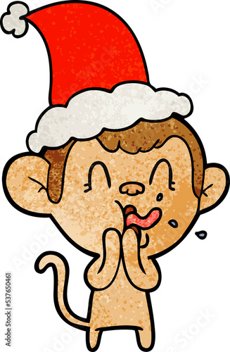 crazy hand drawn textured cartoon of a monkey wearing santa hat