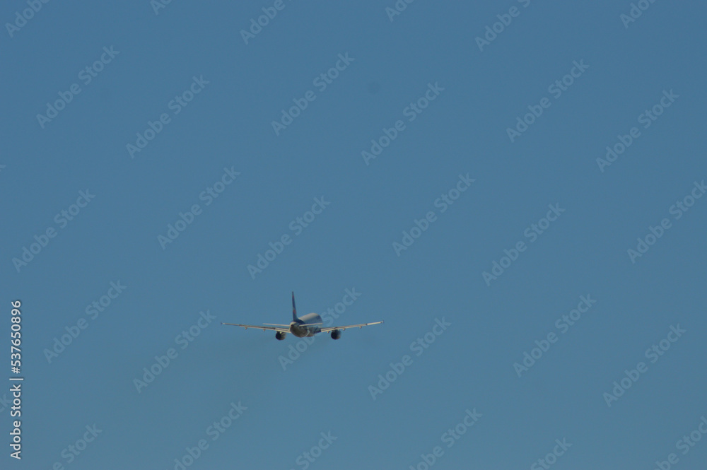 a beautiful plane clearing with a clear blue sky a beautiful plane clearing with a clear blue sky