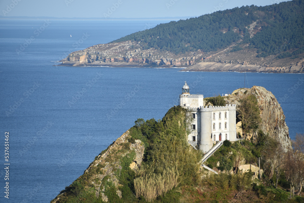 The Faro de la Plata Llighthouse and Cantabrian Sea. Monte Ulia, Pasaia, Gipuzkoa, Basque country, Spain
