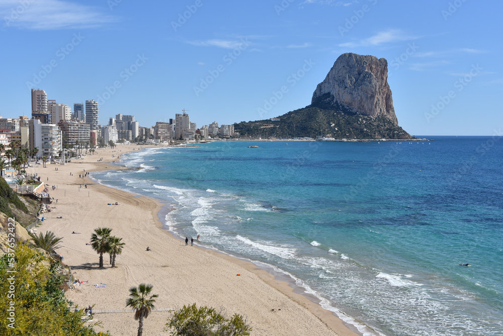 Panoramic view of Calpe Beach and the Penon de Ifach rock formation. Calpe, Alicante, Spain
