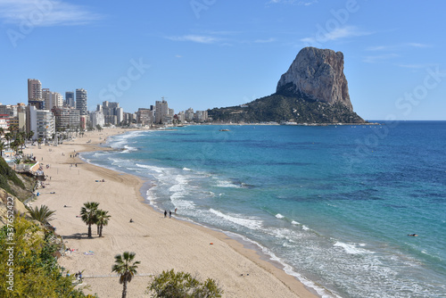 Panoramic view of Calpe Beach and the Penon de Ifach rock formation. Calpe, Alicante, Spain photo