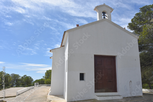 San Salvador Hermitage, a small white chapel overlooking the resort town of Calpe, Alicante, Spain photo