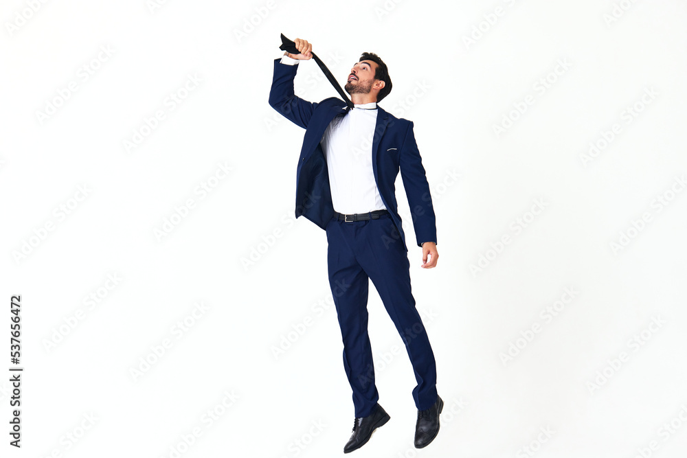 Man business smile with teeth in costume running and jumping flying up open mouth happiness and surprise full-length on white isolated background copy space Man business smile with teeth in costume running and jumping flying up open mouth happiness and surprise full-length on white isolated background copy space
