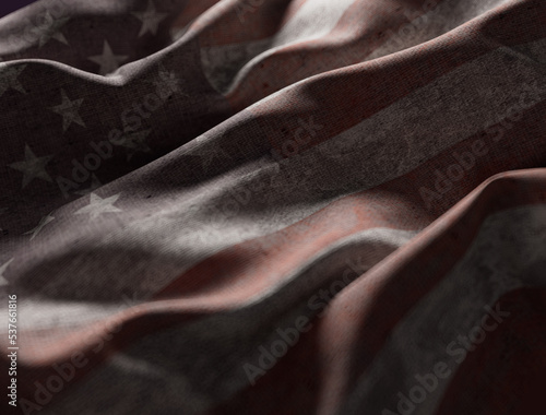 Faded American flag flapping in the wind.