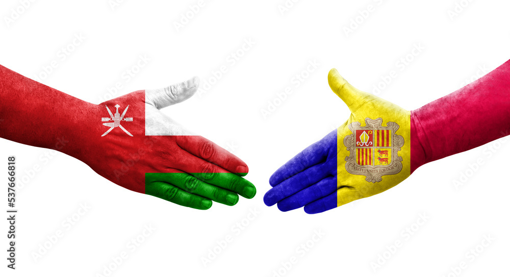 Handshake between Andorra and Oman flags painted on hands, isolated transparent image. Handshake between Andorra and Oman flags painted on hands, isolated transparent image.