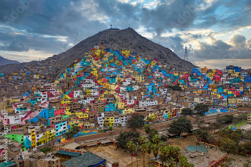 Shanty town in Lima, Peru. The once gray houses of the impoverished district of the Peruvian capital Lima shine in all colors. The campaign aims to attract tourists and improve the lives of residents.