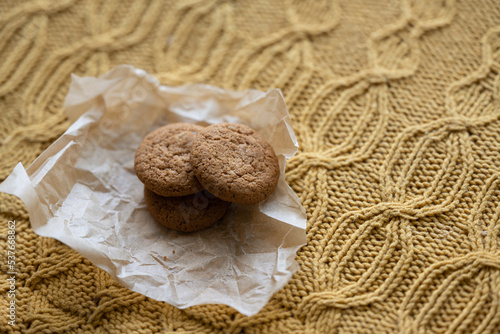 Fresh cookies on textured yellow