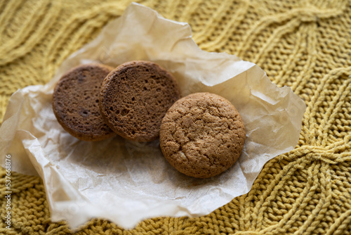 Delicious cookies on parchment paper