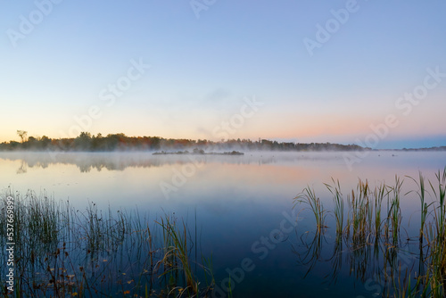 Picturesque Williamstown lake at misty dawn Lakeville New Brunswick Canada