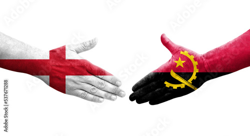 Handshake between Angola and England flags painted on hands, isolated transparent image.