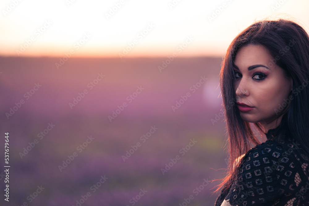Portrait of a beautiful woman in a lavender field