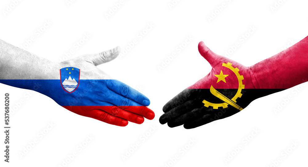 Handshake between Angola and Slovenia flags painted on hands, isolated transparent image. Handshake between Angola and Slovenia flags painted on hands, isolated transparent image.