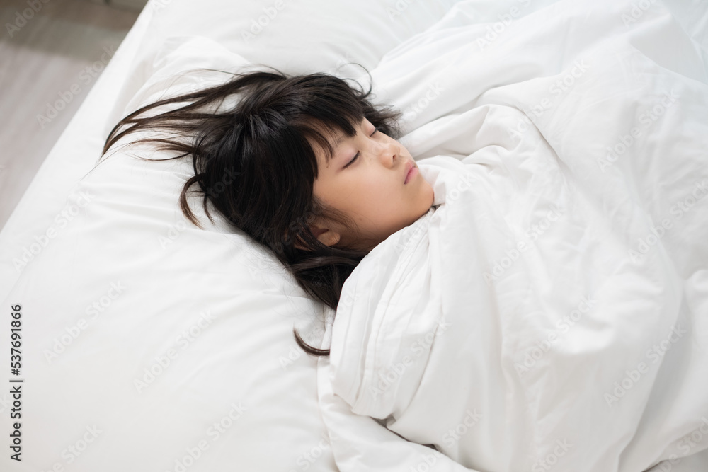 asian kid sleep on bed, sick child asian kid sleep on bed, sick child