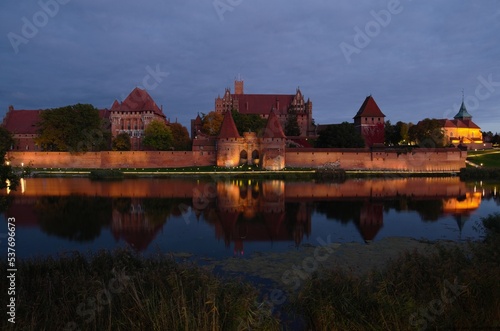 malbork castle by night panorama 