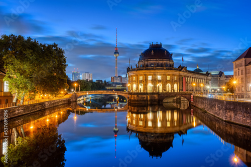 The Bode-Museum and the Television Tower reflected in the river Spree in Berlin at night