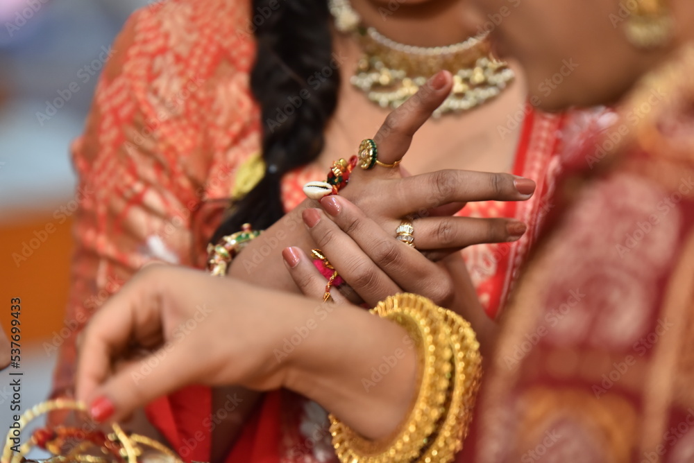 Mumbai, India 14th September 2022: Indian Wedding rituals, Customs and Traditions for bride or Dulhan. Pandit performing holy pooja. Shagun, Mehendi, and old customs. Poojan vidhi and samagri.