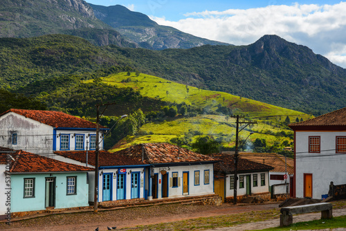 The picturesque main square of small Catas Altas colonial mining town surrounded by the mountains of the Serra do Caraça range, Minas Gerais state, Brazil 
