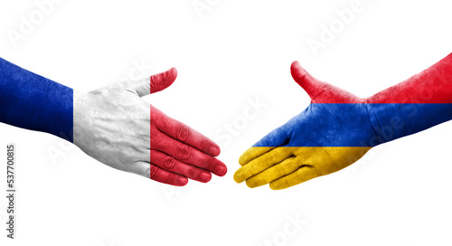 Handshake between Armenia and France flags painted on hands, isolated transparent image.