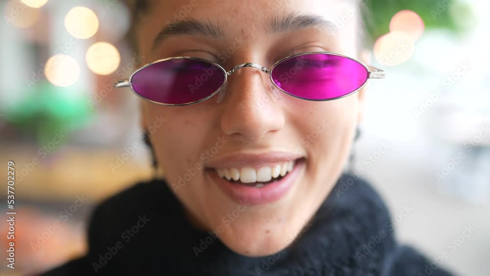 Glamorous white girl fooling around in outdoor cafe. Glamorous white girl fooling around in outdoor cafe.