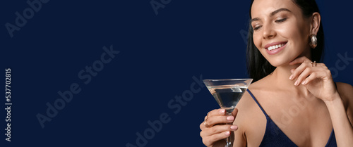 Beautiful young woman drink...