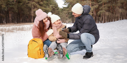 Happy young family drinking...